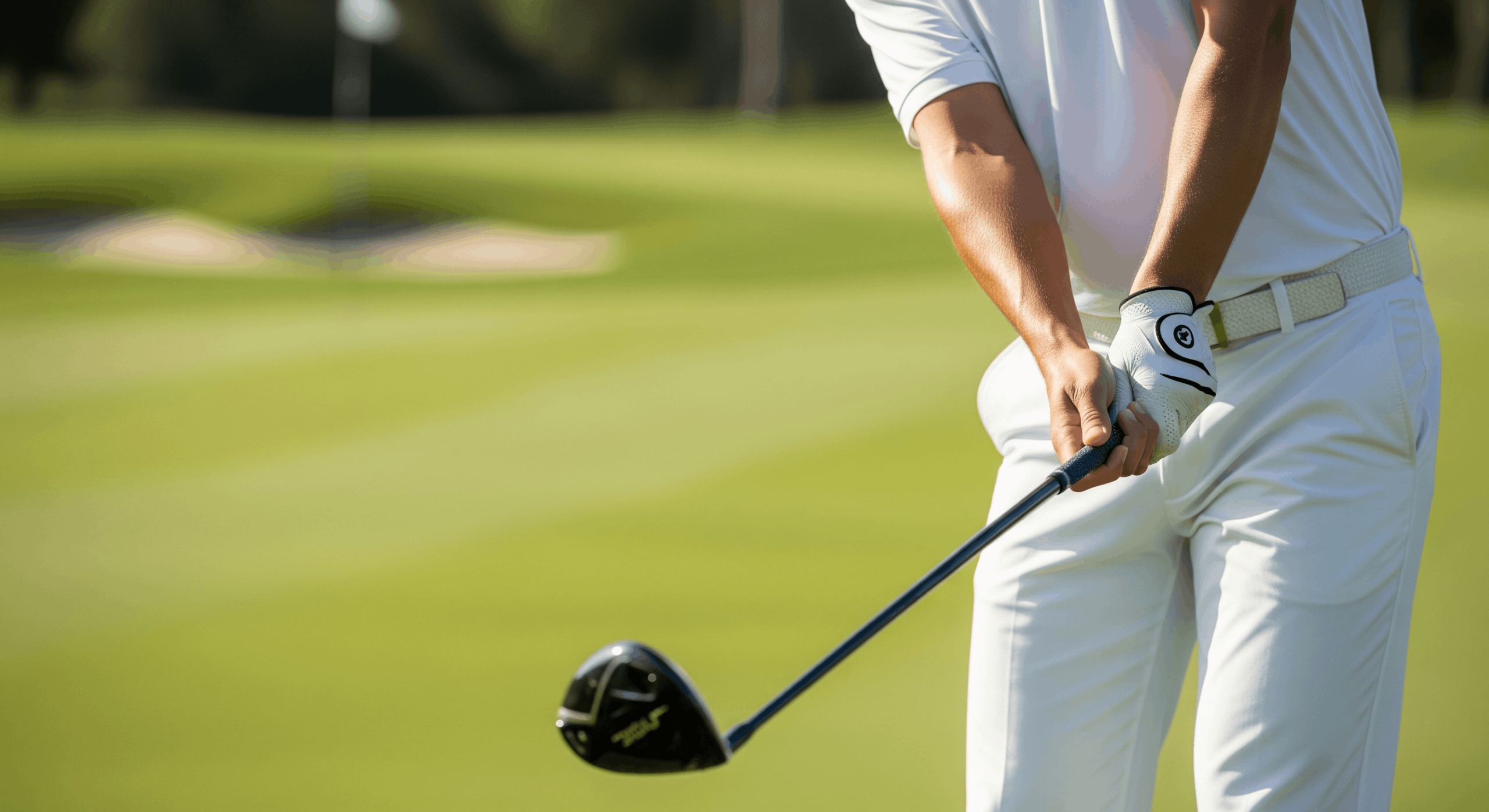 Close-up of a golfer’s hands demonstrating proper driver grip technique